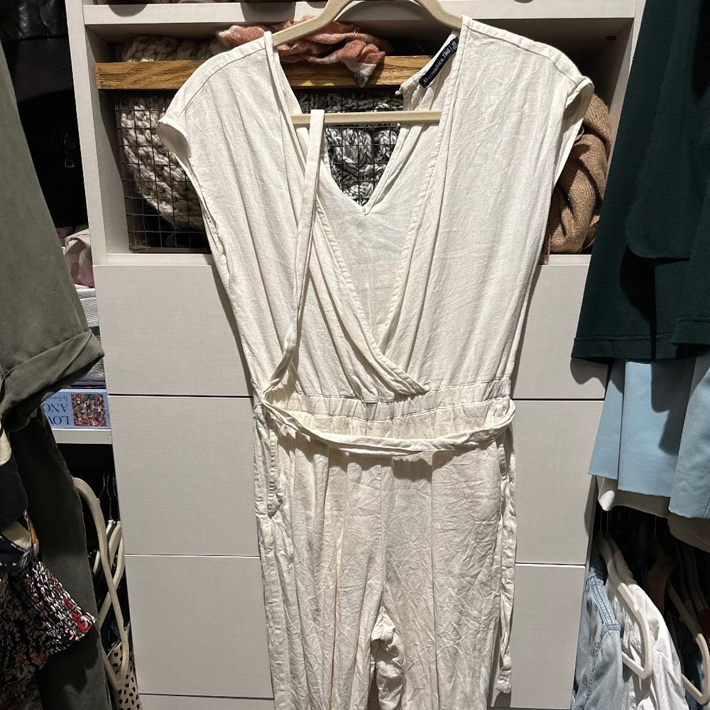 A&F Jumpsuit Cream color linen material, worn once. Straight left, belt, pockets
